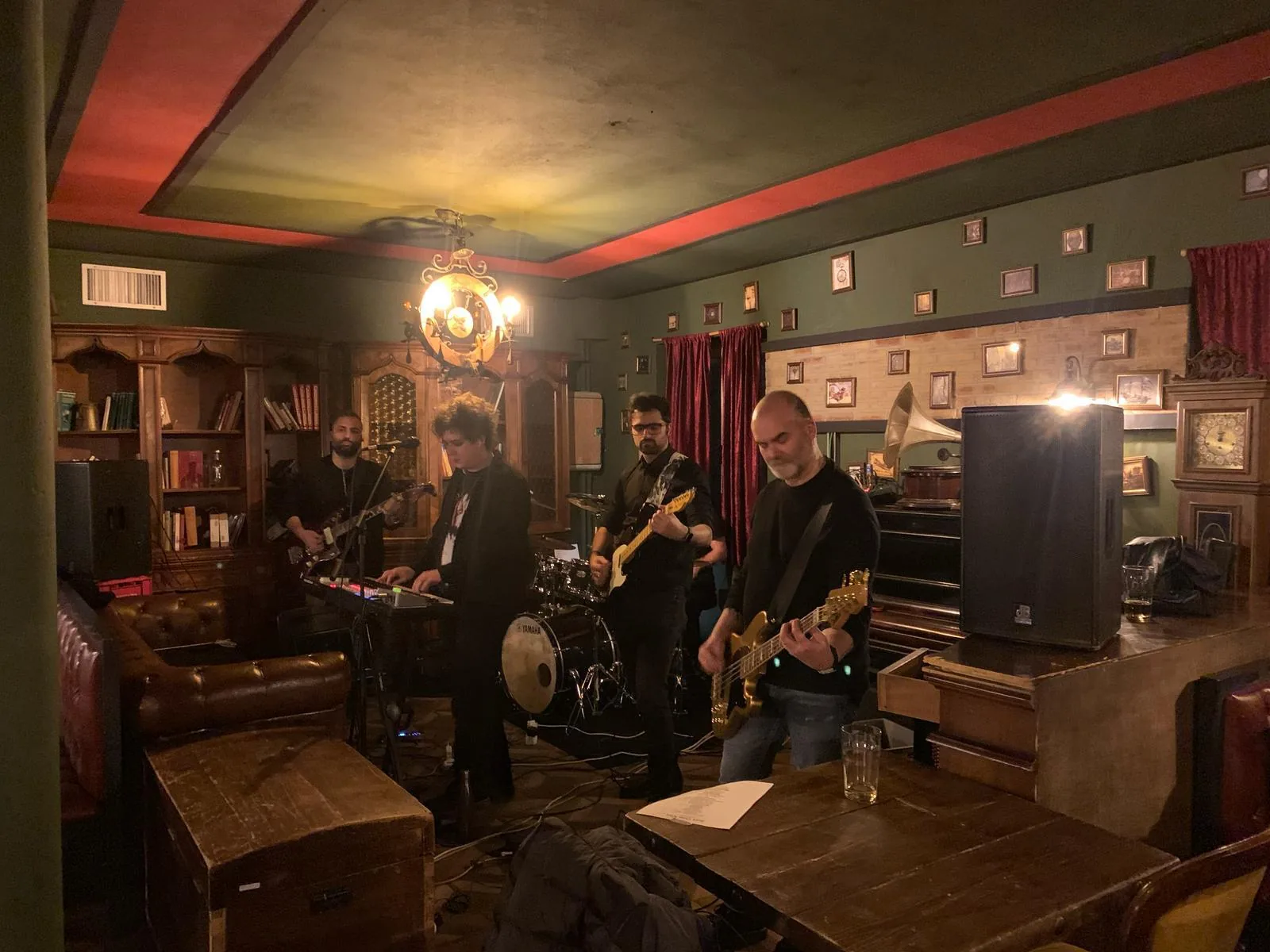 The band playing in a vintage room